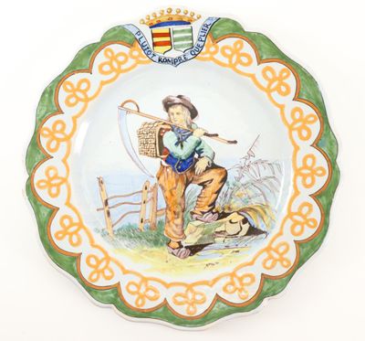 a plate with a picture of a boy on it