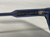 the glasses are blue and have gold details on the temples