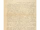 une lettre écrite à l'encre noire sur une feuille de papier