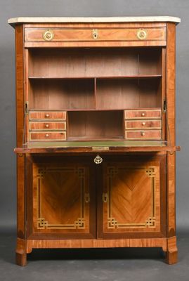 an antique wooden cabinet with two drawers and a marble top