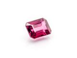 a pink tourmaline stone on a white background