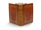 un livre ouvert sur une surface blanche