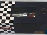 a black and white box with a wine bottle inside of it