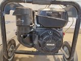 an image of a small engine on a cart