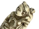 a figurine of a man holding a bird on his back