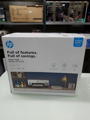 the box is open on the table in front of the computer