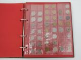 a red binder with a bunch of coins in it