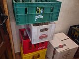 boxes of beer are stacked on top of each other in a room