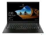 un ordinateur portable dont l'écran et le clavier sont noirs, posé sur une surface blanche
