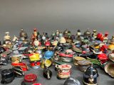 a lot of different types of hats and hats on the table