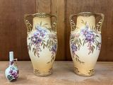 two vases that are sitting on a table