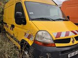 a yellow van that is parked next to a orange van