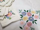 many napkins that have different designs on them