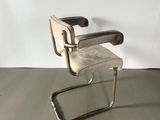 an image of a chair that is sitting on a floor