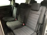 the back seats of a car with a black seat belt
