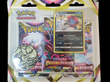 une photo d'une boîte de cartes Pokémon posée sur une table
