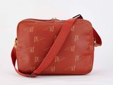 an image of a small red bag with a triangle pattern on it