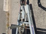 a car that is parked next to a ladder