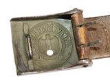 an old belt buckle with the emblem of the united states of america on it