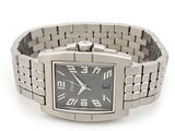 wrist watch on a silver bracelet with a black face