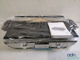 a piece of luggage wrapped in plastic on a table