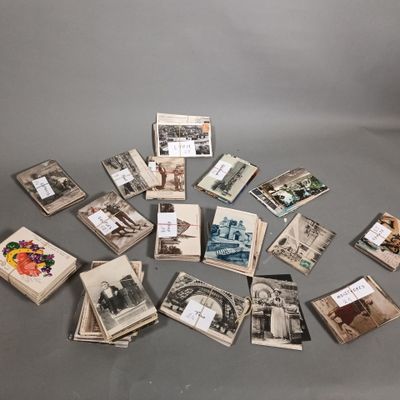 a lot of old postcards on the table