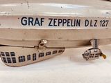 a small model of a graf zeppelin plane on display
