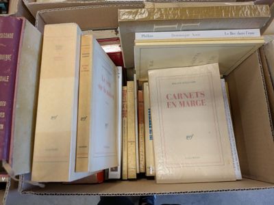 a box full of books sitting on the floor