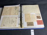 an open book that has a lot of papers on it