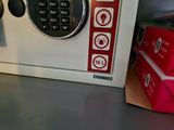 a safe box with a combination lock on it and a box of cigarettes