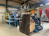 an image of a factory with a lot of machines