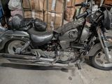 a motorcycle that is parked in a garage
