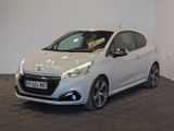 the small white car is parked in the showroom of a dealers showroom