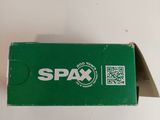 an open box of spax soap sitting on top of a white table