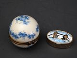 a blue and white box with a picture of a bird on it