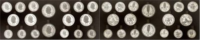 black and white photograph of a wall with a lot of circles on it