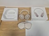 a white box with a pair of headphones on top of it