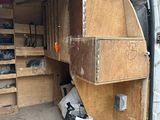 a van that has a bunch of boxes inside of it