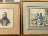 deux tableaux encadrés représentant des hommes et des femmes, posés sur une étagère dans une pièce