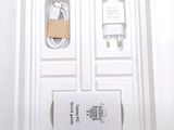 a white box with a charger and a charger in it