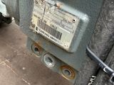 a close up of a machine that is sitting on the ground