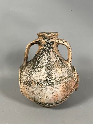 a vase that is sitting on a table