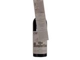 a bottle of wine that is sitting on a table