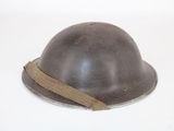 a helmet that is sitting on a white surface