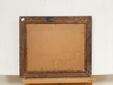 a picture of a painting on a easel on a table