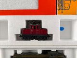 a toy train that is sitting in a box