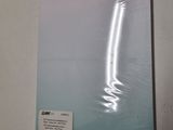 a close up of a piece of paper on a wall