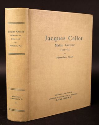 a close up of a book on a table with a black background