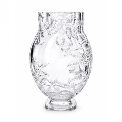 un vase en verre transparent orné d'un motif floral