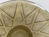 a glass bowl that has a pattern on it